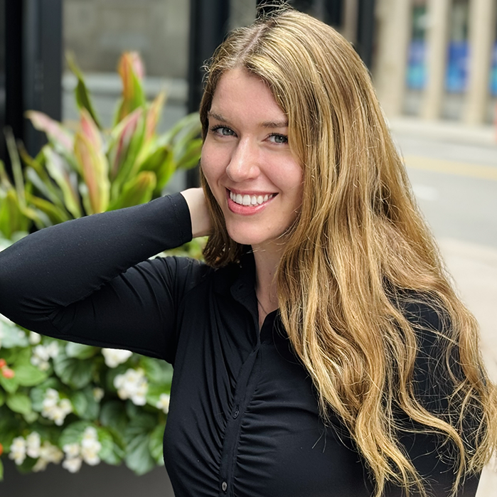 Woman smiling after cosmetic dentistry in Boston