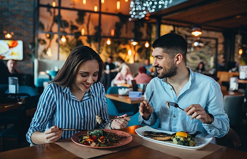 Young couple enjoying a meal in a restaurant