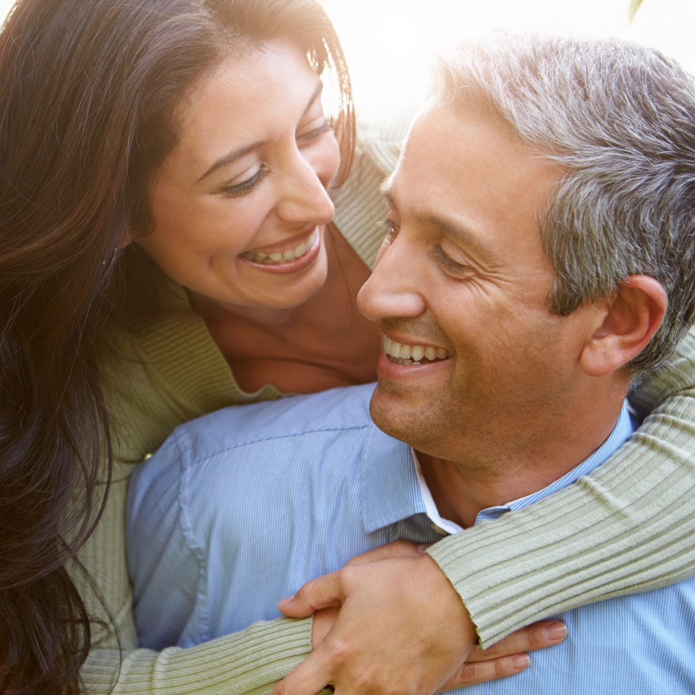Man and woman smiling at each other