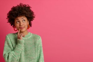 Woman wearing curious expression